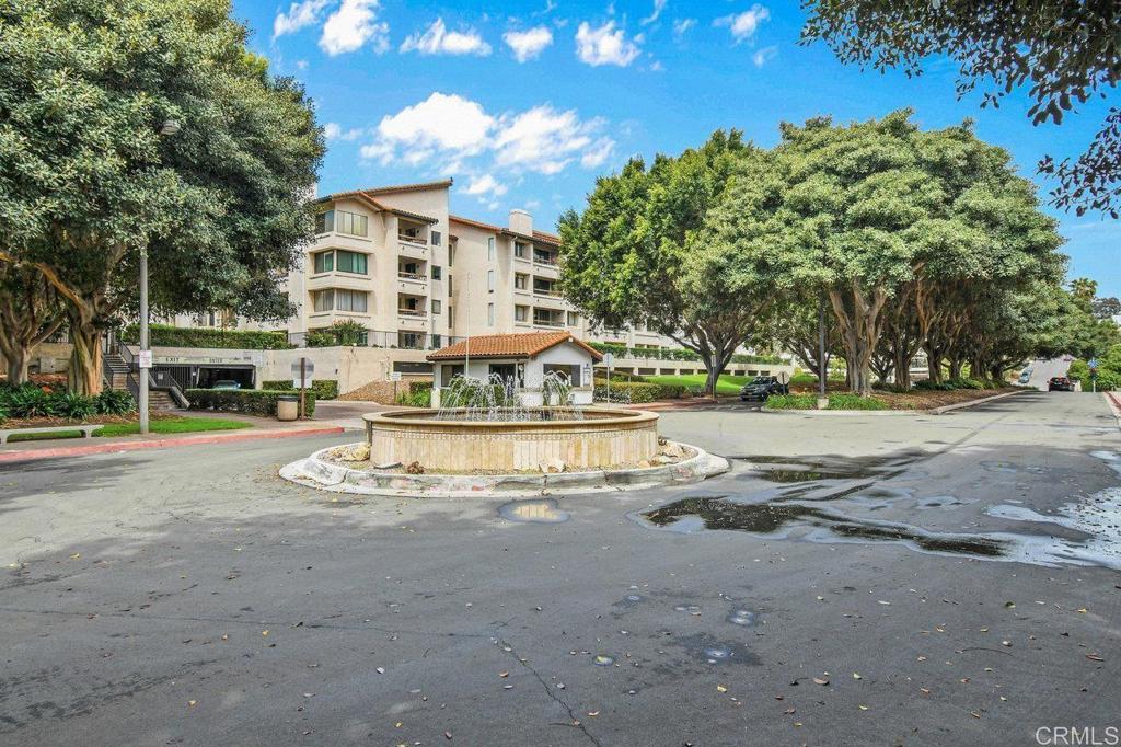 5745 Friars Road, Unit 116 San Diego, CA 92110 - Photo 34 of 44 a view of a water fountain in front of a building