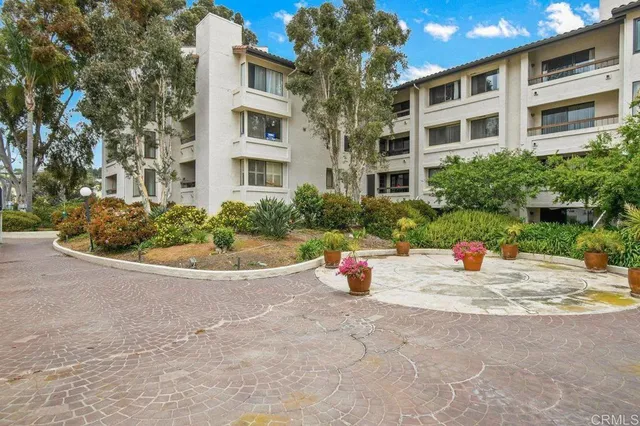 a view of a swimming pool with a lounge chairs