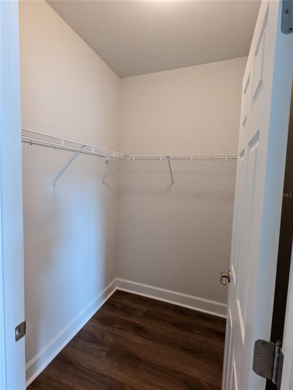 7782 Southwest 64th Lane, Unit 1002 Gainesville, FL 32608 - Photo 17 of 42 a view of a room with racks on the wall