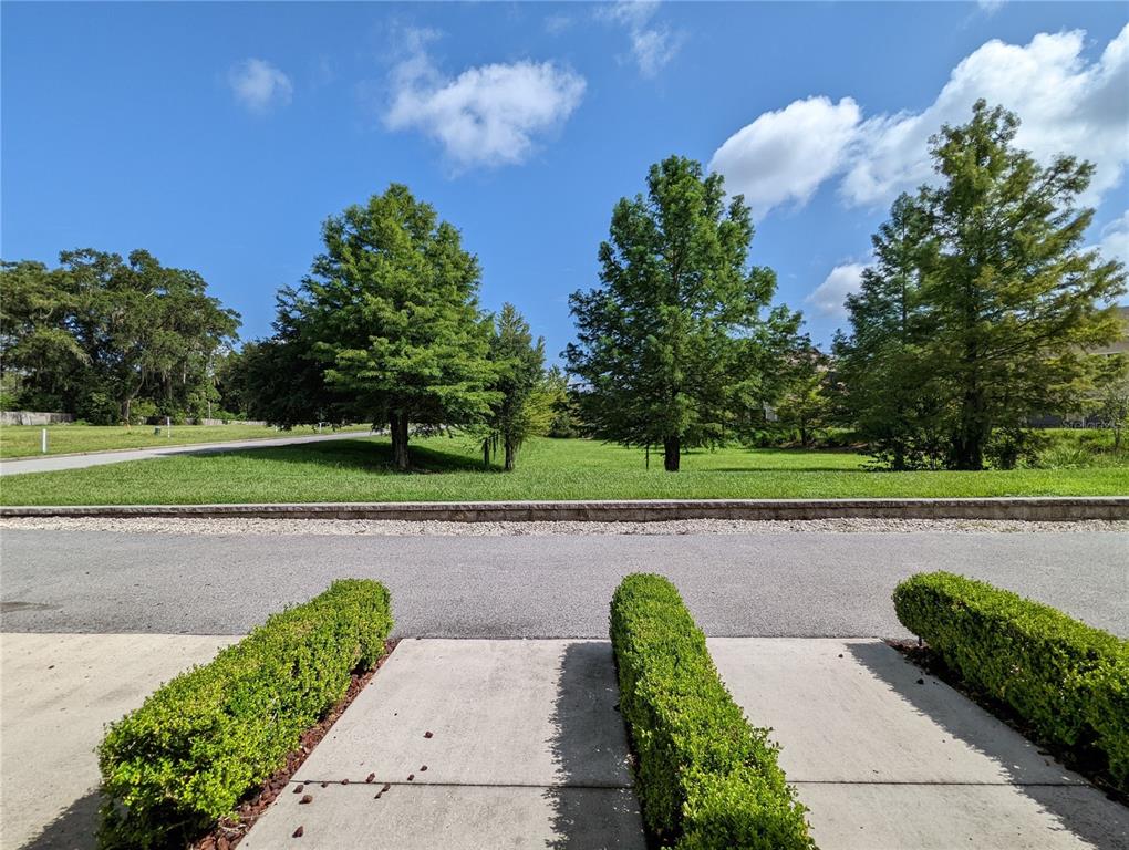 7782 Southwest 64th Lane, Unit 1002 Gainesville, FL 32608 - Photo 3 of 42 a view of a swimming pool and outdoor space