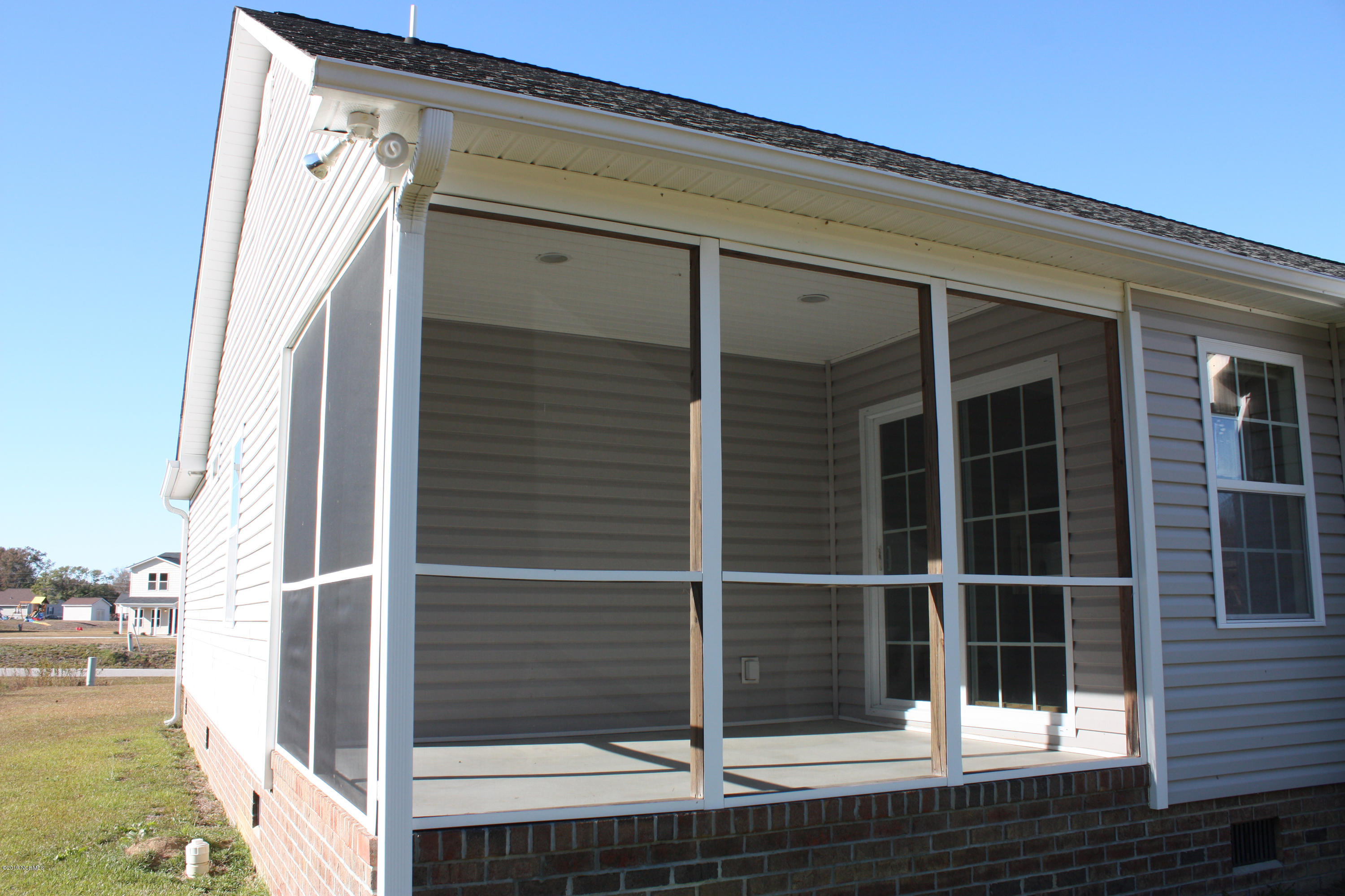 2017 Fish Pond Road Greenville, NC 27834 - Photo 3 of 31 Screened Rear Porch