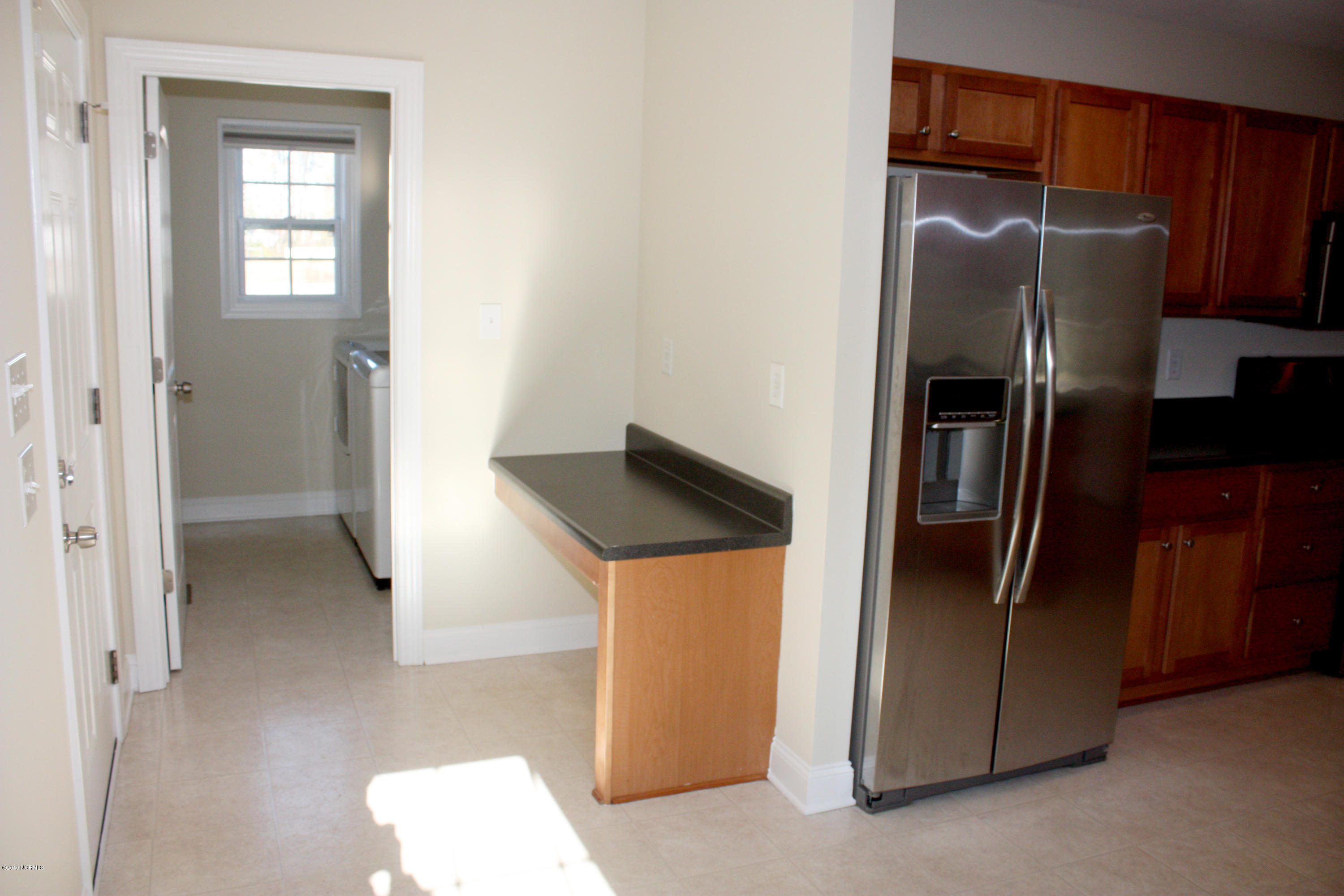 2017 Fish Pond Road Greenville, NC 27834 - Photo 9 of 31 Desk area is located outside the laundry room