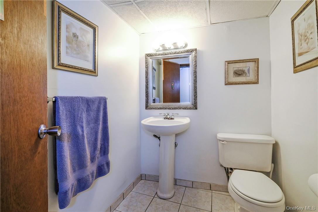 107 Lee Road Scarsdale, NY 10583 - Photo 21 of 31 Lower Level Powder Room