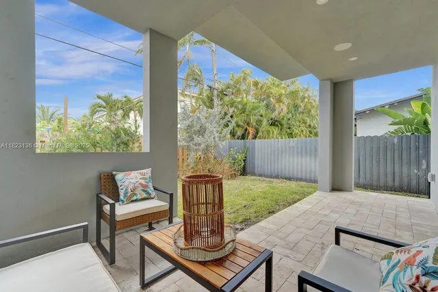 a view of outdoor sitting area with furniture