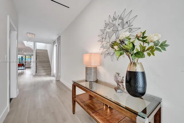 a vase of flowers sitting on a table