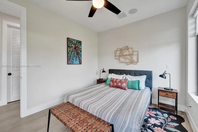 a utility room with sink dryer and washer