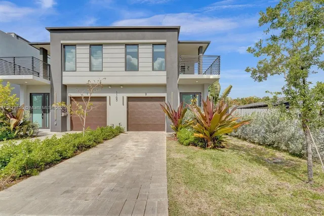 a house view with a garden space