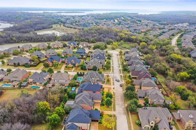 an aerial view of residential building and lake view