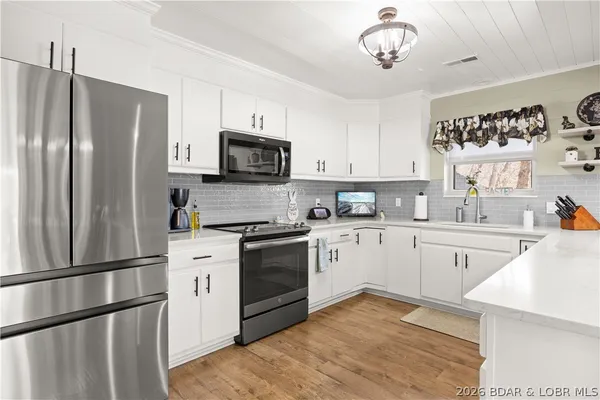 $560,000 | 475 Woodland Point, Linn Creek, MO 65052