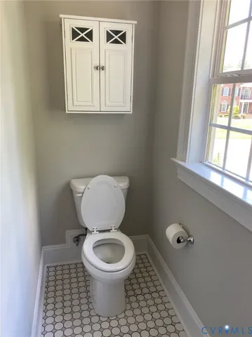 a bedroom with a bed and a table in it