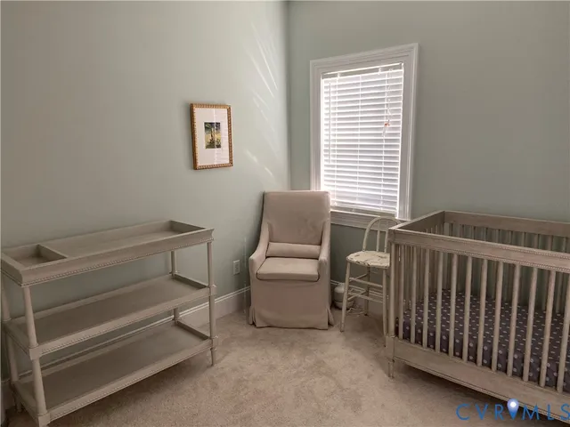 a bathroom with a double vanity sink a mirror a vanity and a shower