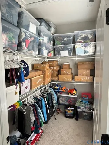 a dining room with a large window table and chairs