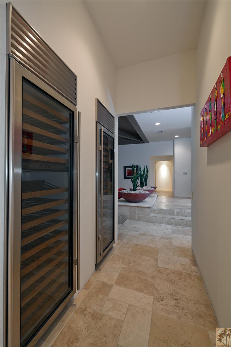 70669 Boothill Road Rancho Mirage, CA 92270 - Photo 15 of 27 a view of hallway with wooden floor