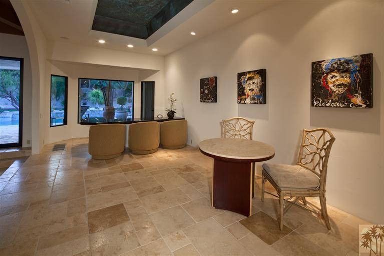70669 Boothill Road Rancho Mirage, CA 92270 - Photo 16 of 27 a living room with furniture and a large window