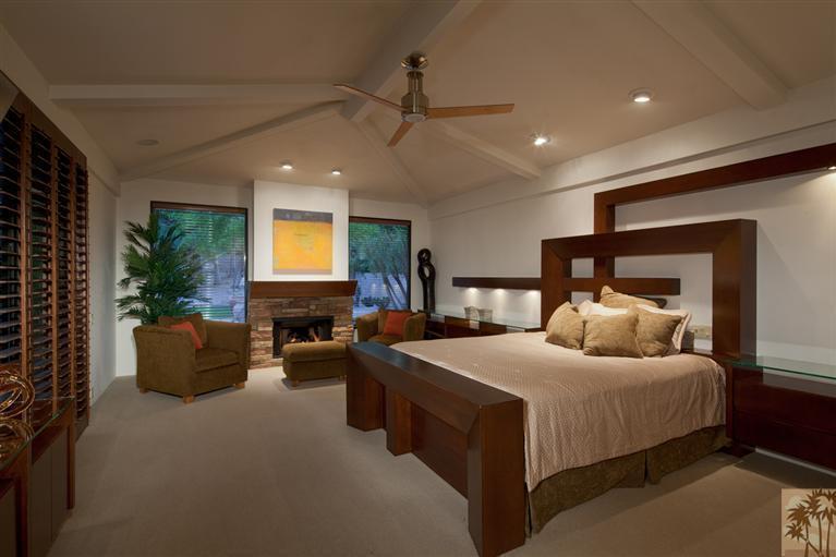 70669 Boothill Road Rancho Mirage, CA 92270 - Photo 18 of 27 a bedroom with a large bed and a couch