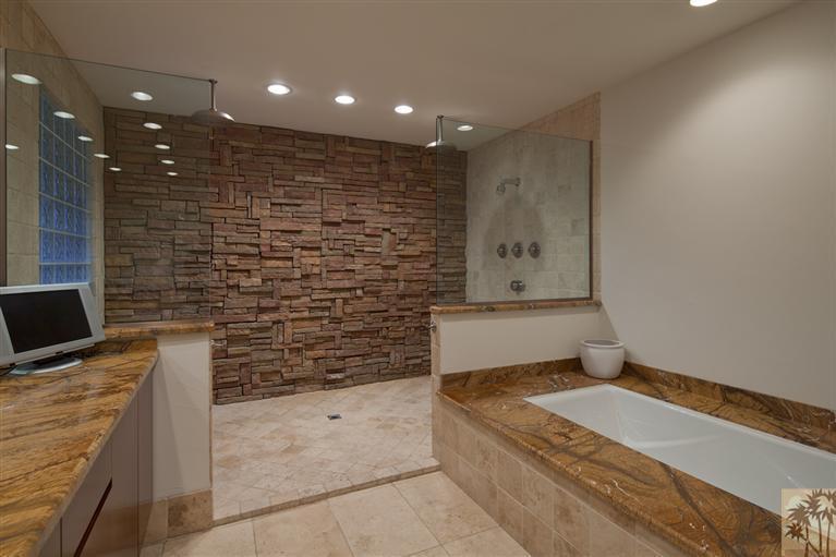 70669 Boothill Road Rancho Mirage, CA 92270 - Photo 21 of 27 a bathroom with a bathtub and shower