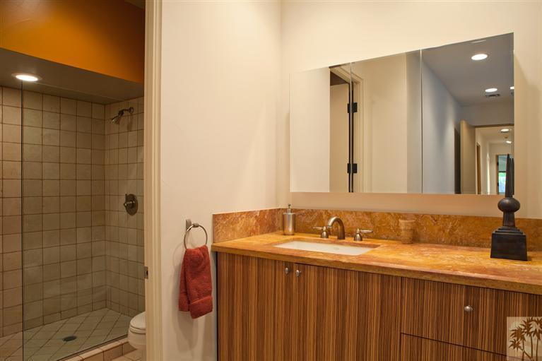70669 Boothill Road Rancho Mirage, CA 92270 - Photo 23 of 27 a bathroom with a sink and a mirror
