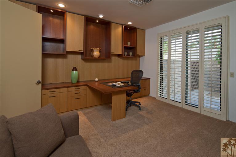 70669 Boothill Road Rancho Mirage, CA 92270 - Photo 24 of 27 a kitchen with a sink cabinets and wooden floor
