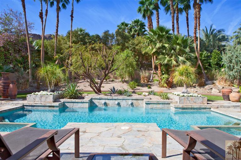 70669 Boothill Road Rancho Mirage, CA 92270 - Photo 27 of 27 a backyard of a house with outdoor seating