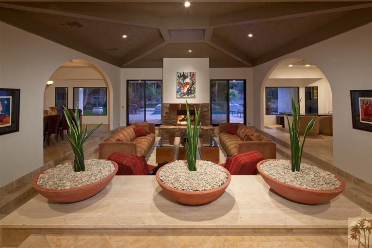 70669 Boothill Road Rancho Mirage, CA 92270 - Photo 8 of 27 a living room with furniture and a fireplace