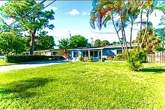 a house view with a garden space