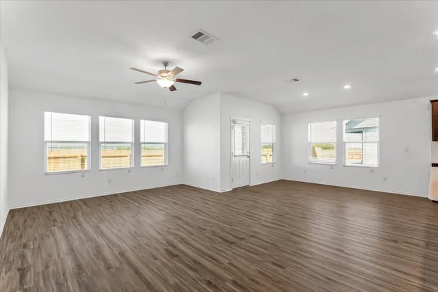 a kitchen that has a sink and a stove in it