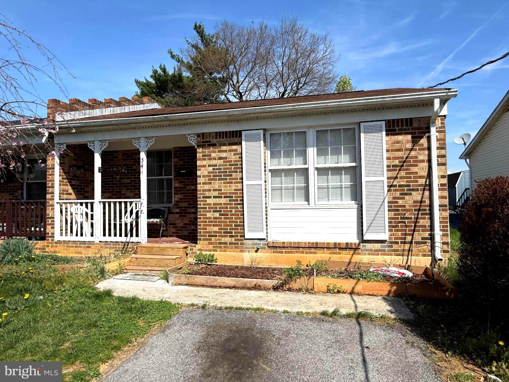 341 West 9th Street Front Royal, VA 22630 - Photo 1 of 21 Charming brick home with inviting porch.