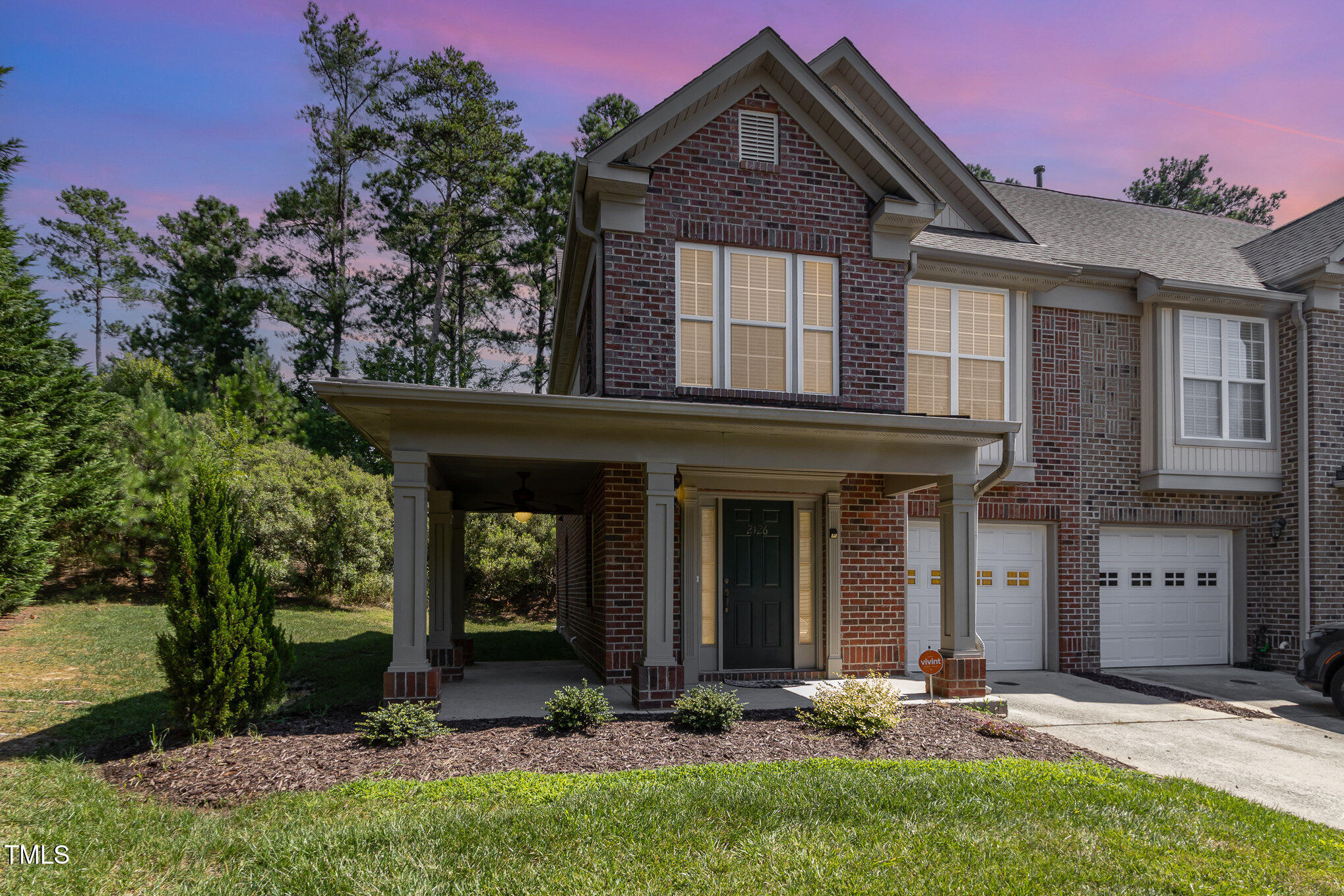 2126 Kedvale Avenue Raleigh, NC 27617 - Photo 1 of 18 a front view of a house with garden