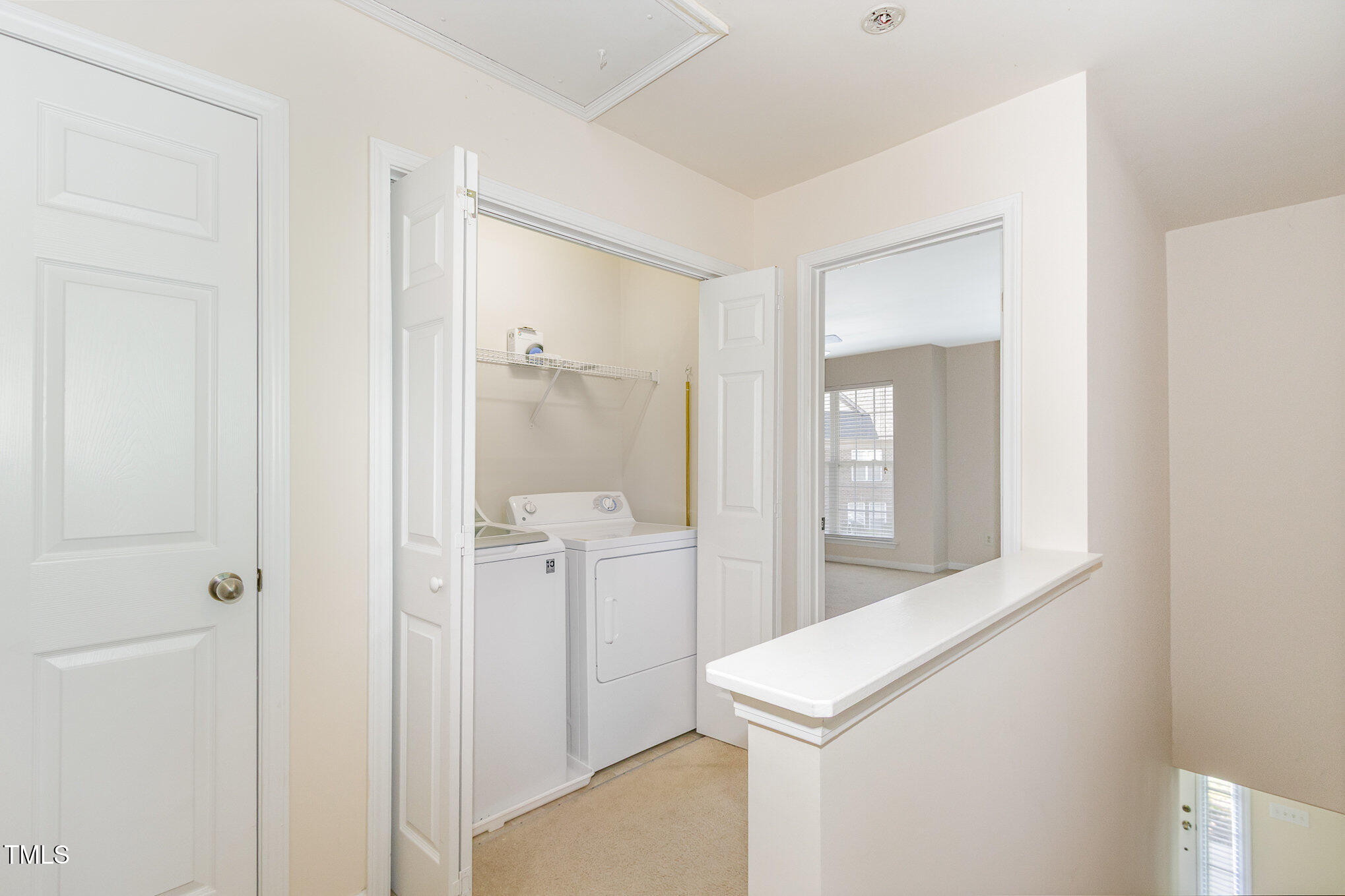2126 Kedvale Avenue Raleigh, NC 27617 - Photo 11 of 18 a room with a washer and dryer