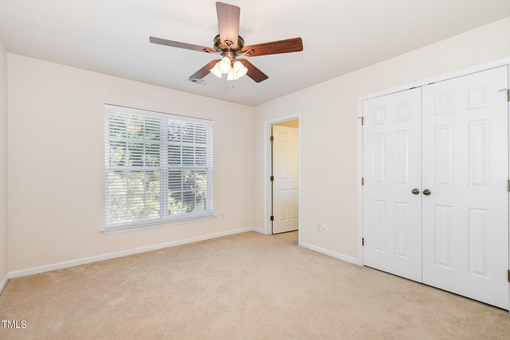 2126 Kedvale Avenue Raleigh, NC 27617 - Photo 16 of 18 a view of an empty room with a window
