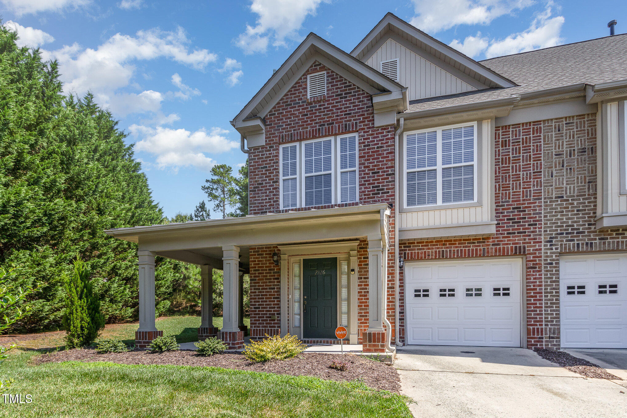 2126 Kedvale Avenue Raleigh, NC 27617 - Photo 2 of 18 front view of a house with a yard