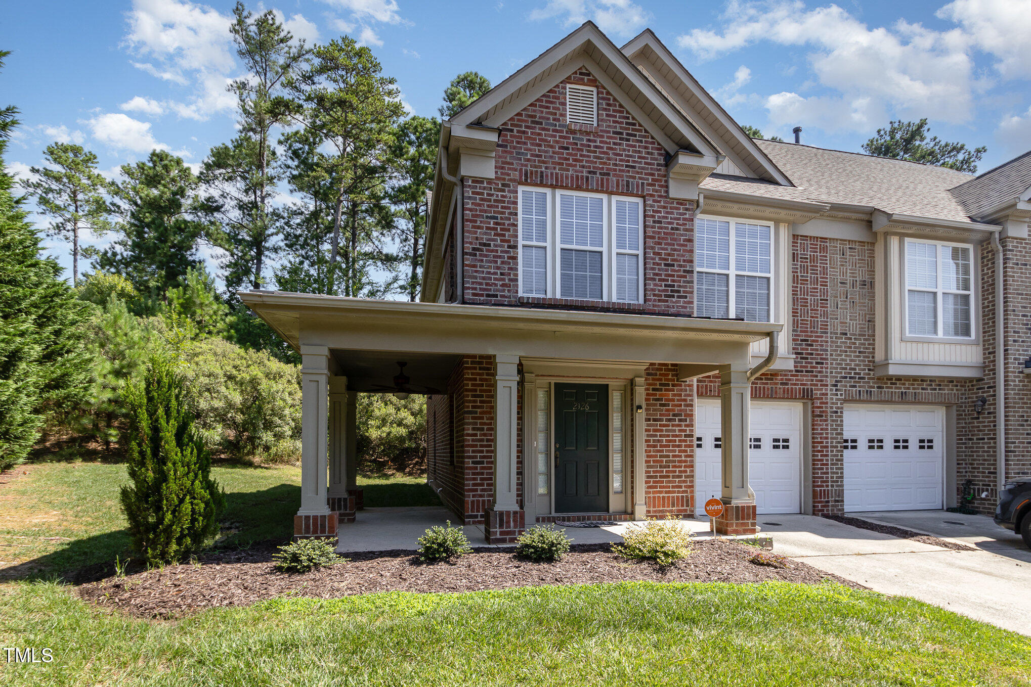 2126 Kedvale Avenue Raleigh, NC 27617 - Photo 3 of 18 a front view of a house with garden