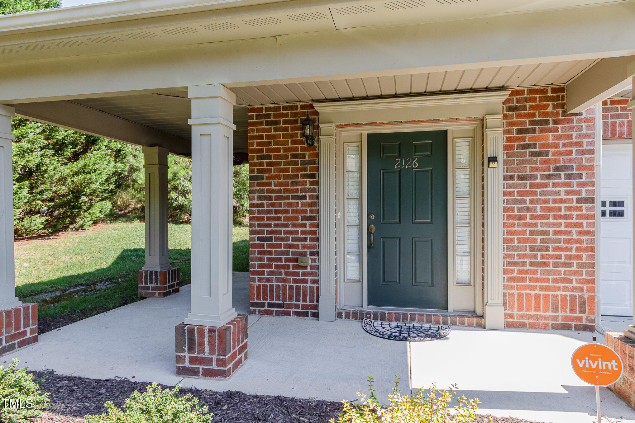 2126 Kedvale Avenue Raleigh, NC 27617 - Photo 4 of 18 a front view of a house with a yard