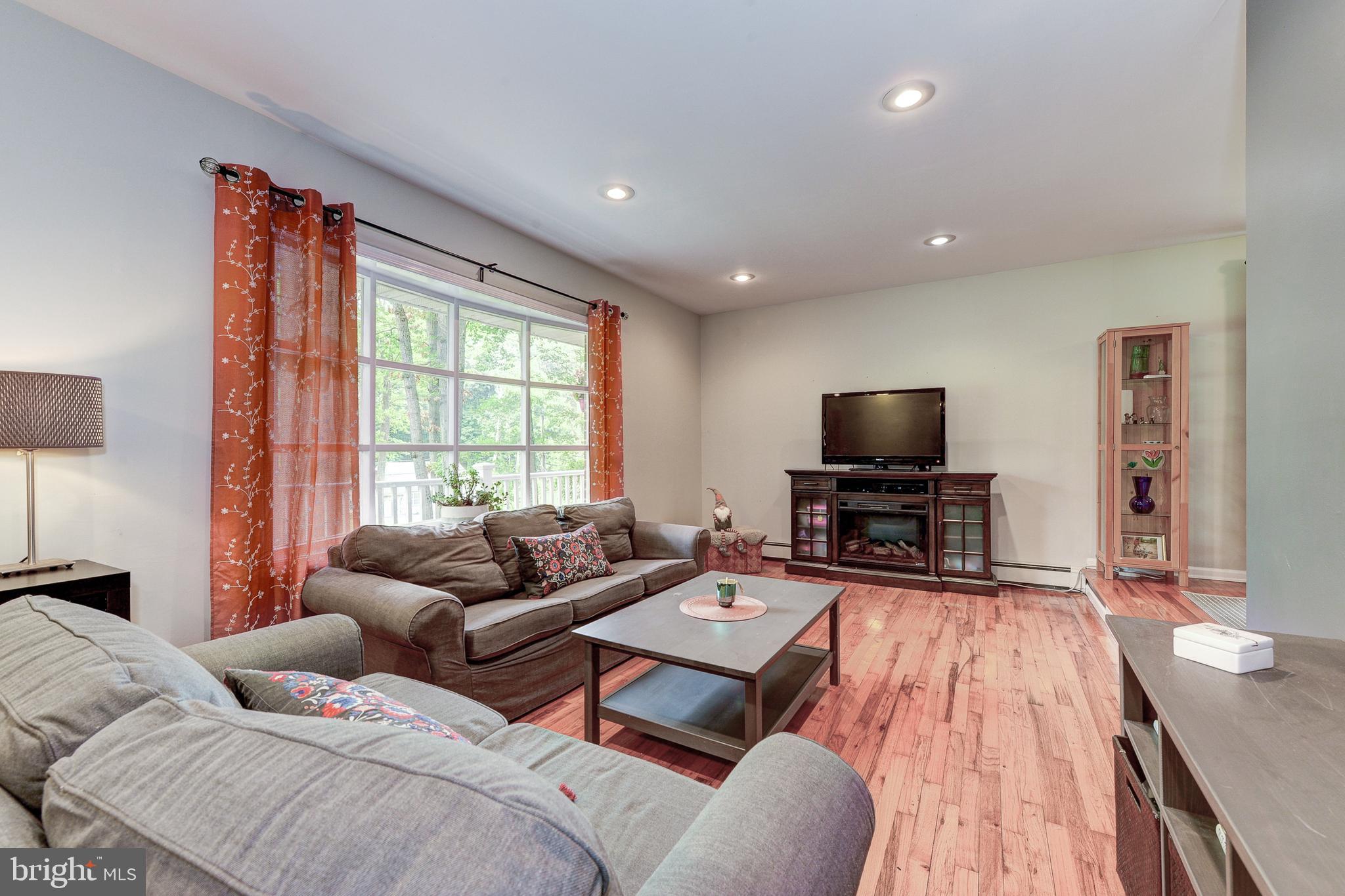 78 Spring Road Malvern, PA 19355 - Photo 6 of 35 living room with recessed lighting on dimmers