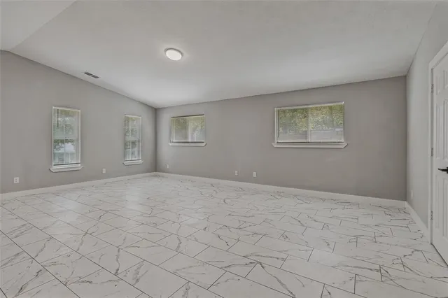 a view of an empty room with window