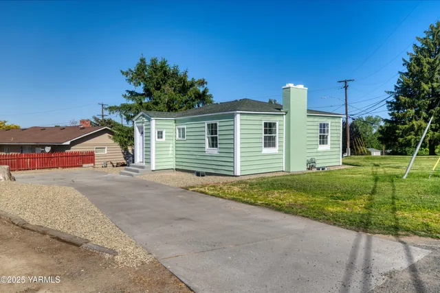 a house view with a garden space