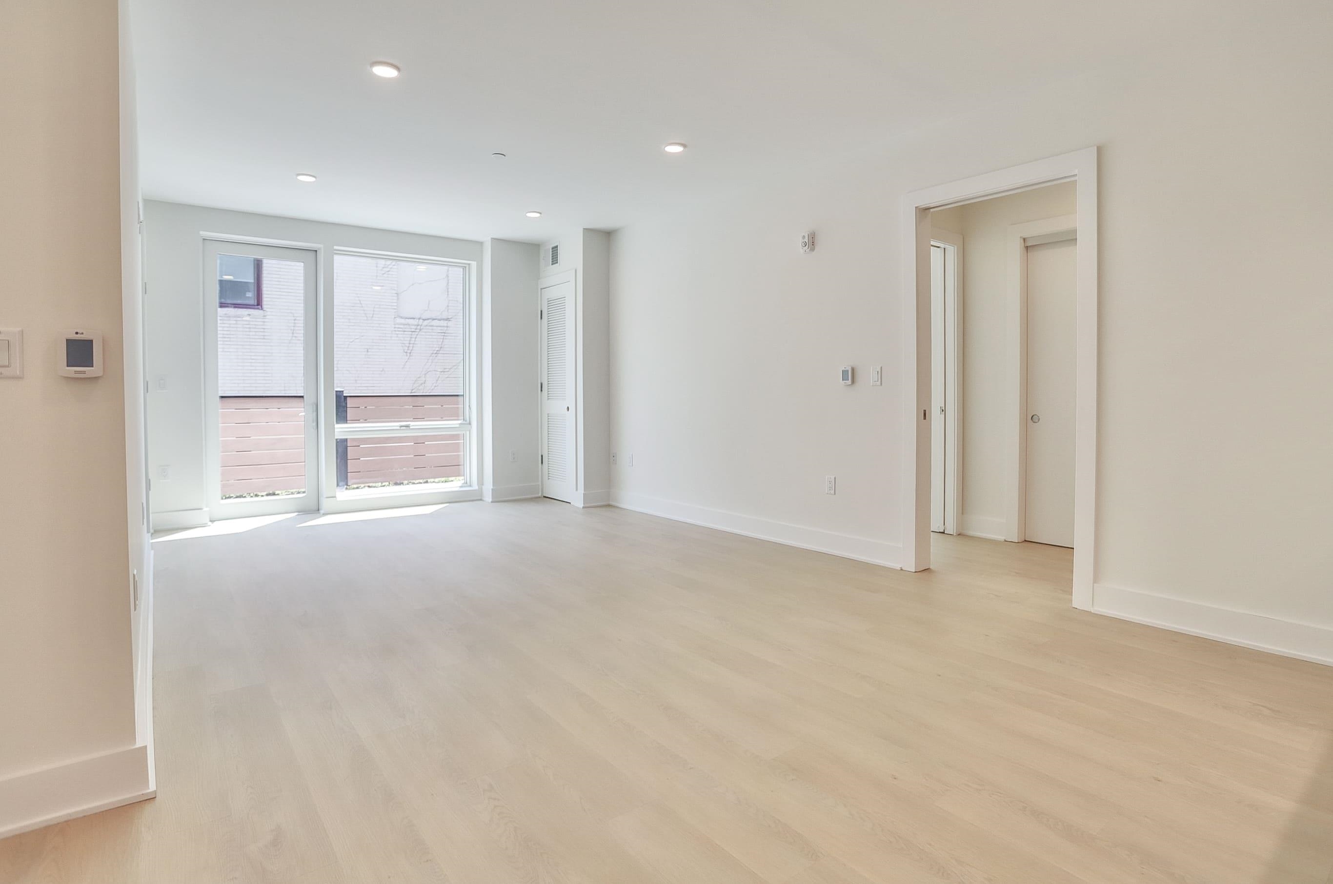303 Madison Street, Unit 306 Hoboken, NJ 07030 - Photo 11 of 24 a view of an empty room with a window