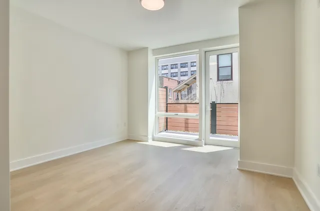 an empty room with window