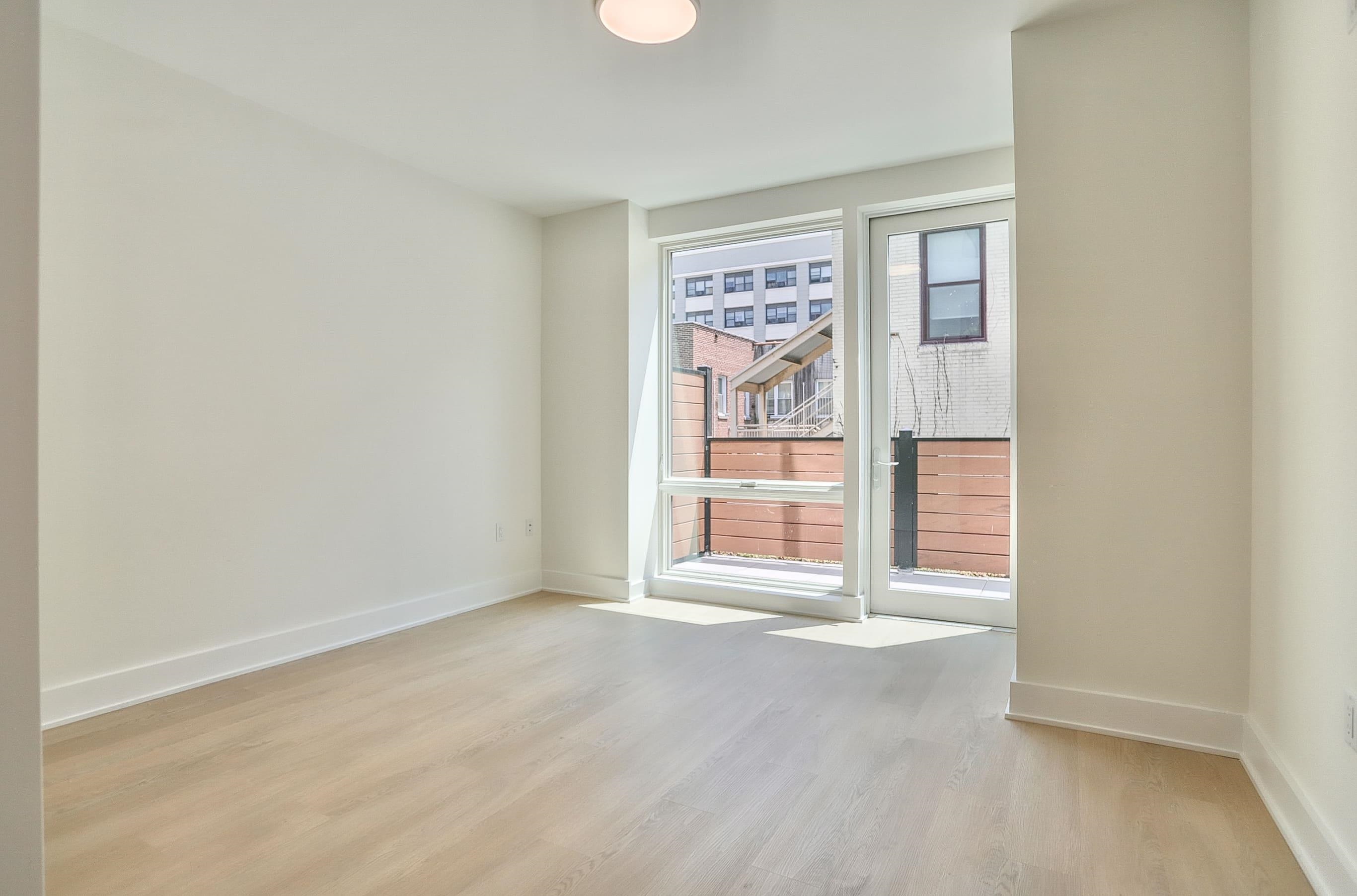 303 Madison Street, Unit 306 Hoboken, NJ 07030 - Photo 12 of 24 an empty room with window