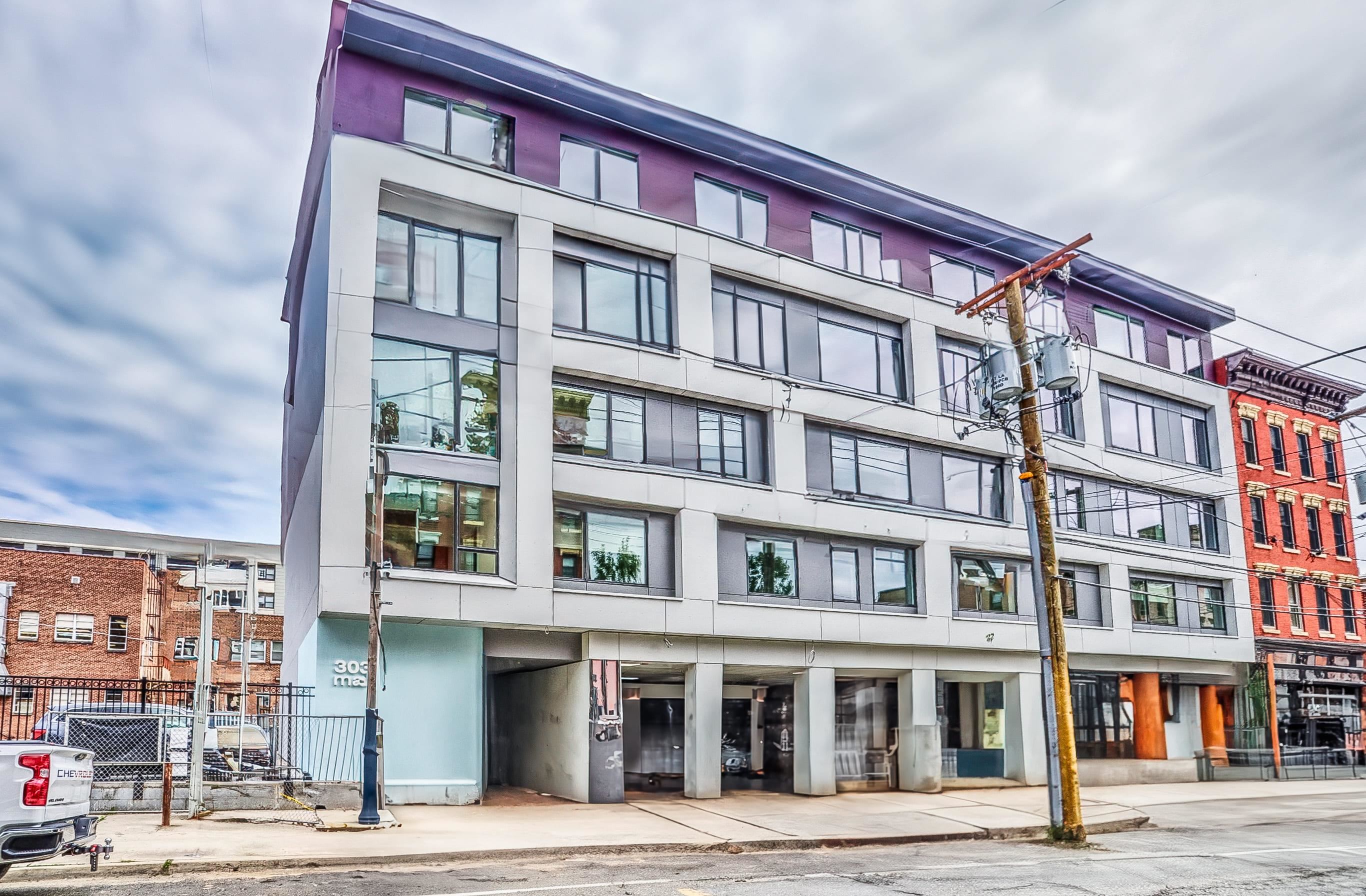 303 Madison Street, Unit 306 Hoboken, NJ 07030 - Photo 24 of 24 a front view of a multi story building