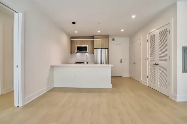 a view of a kitchen with a sink