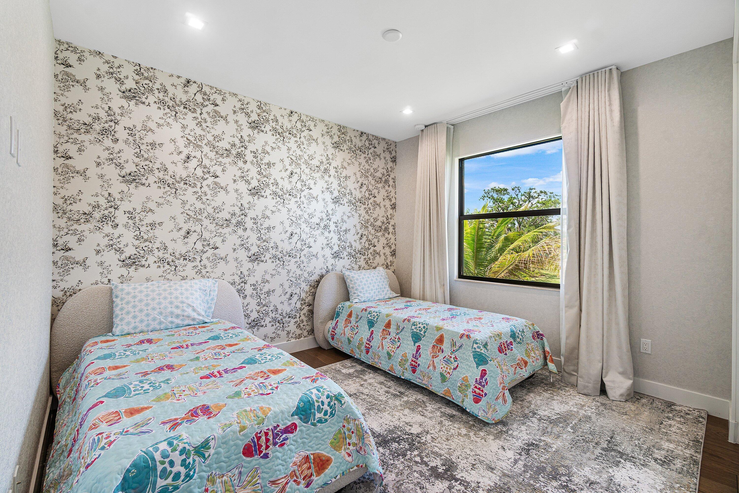 8233 Crystal Downs Avenue Boca Raton, FL 33434 - Photo 49 of 58 a bedroom with two beds and a window