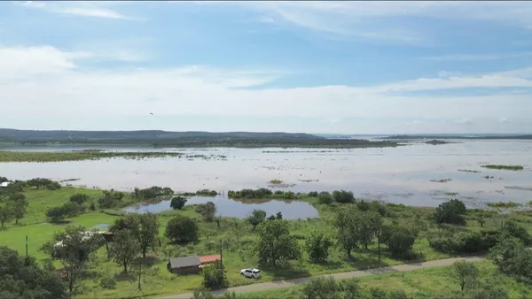 a view of a lake with outdoor space
