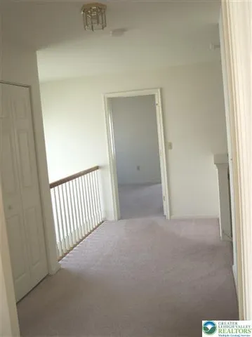 a view of a hallway and window