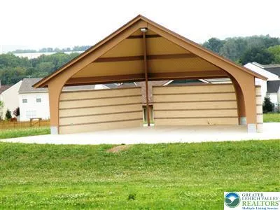 a view of a backyard of the house