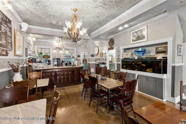 a view of a dining room with furniture