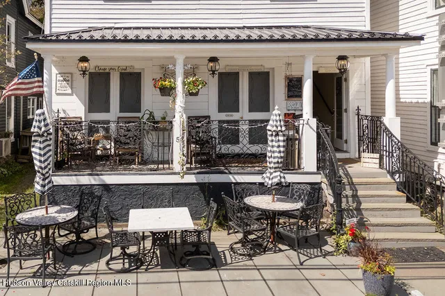 a view of a table and chairs in patio