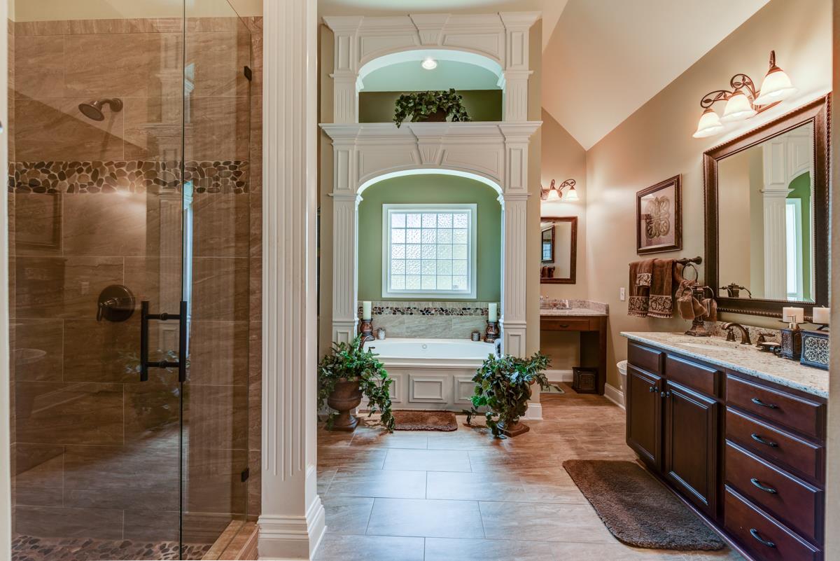 3338 Allen Barrett Road Murfreesboro, TN 37129 - Photo 12 of 27 a spacious bathroom with a sink a mirror and a shower