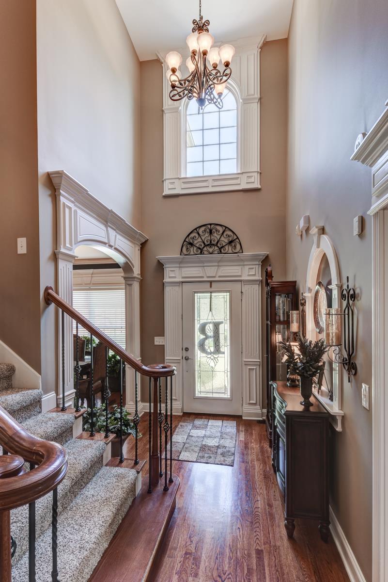3338 Allen Barrett Road Murfreesboro, TN 37129 - Photo 3 of 27 a view of a livingroom with furniture stairs and a chandelier