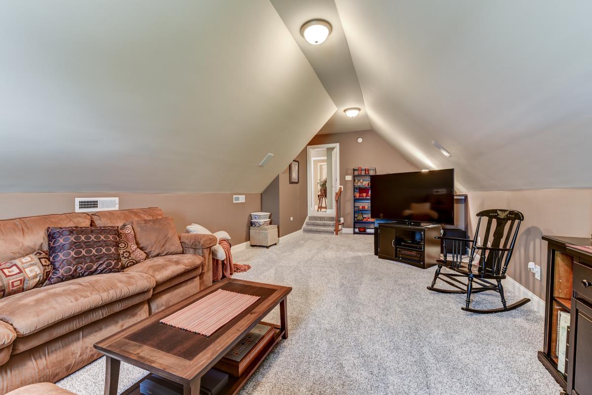 3338 Allen Barrett Road Murfreesboro, TN 37129 - Photo 22 of 27 a living room with furniture and a flat screen tv